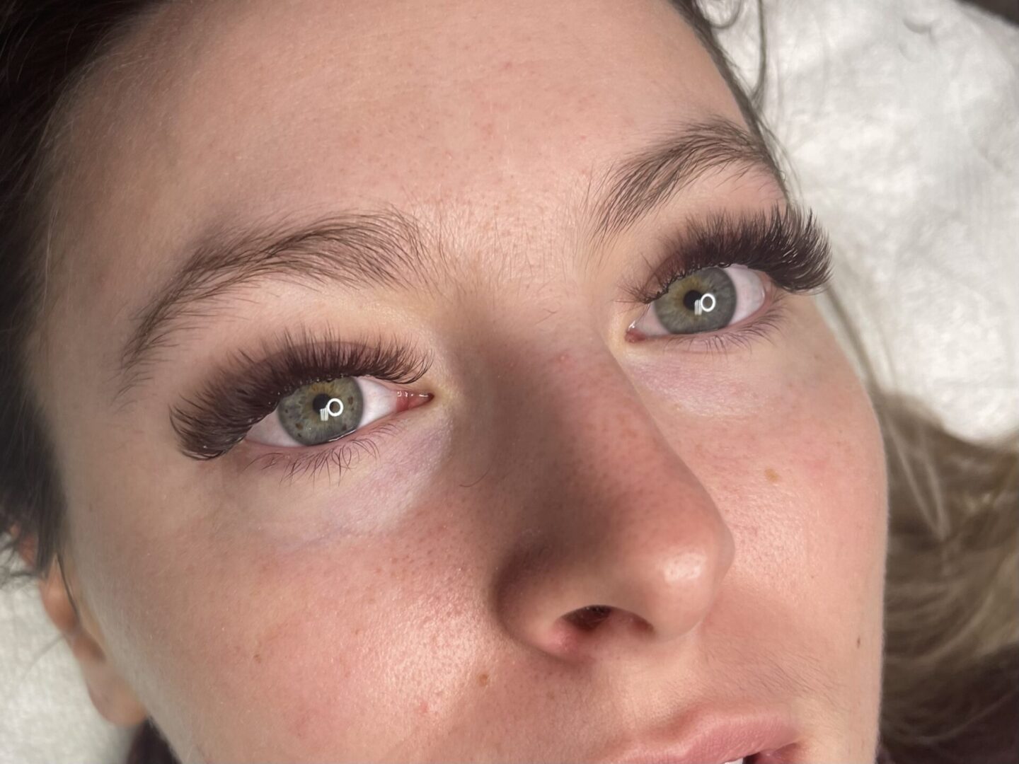 Close-up of eyes with eyelash extensions.